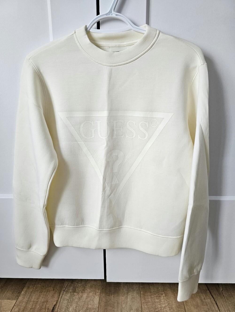 Guess Women's Cream/Off-White Embossed Logo Crewneck Sweater